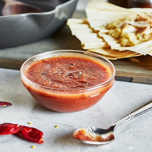 Chile rojo salsa translates simply to “red chili sauce”—and while it is simple to make, the result is a beautifully complex medley of flavors. 

